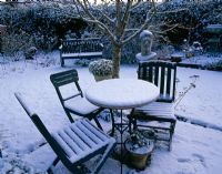 Table and chairs in snow - Woodchippings, Northamptonshire 