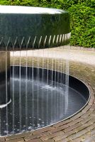 Contemporary 'Meniscus' water sculpture in The Serpent Garden at The Alnwick Garden