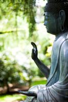 Garden Buddha statue at Batsford Arboretum