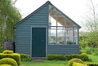 Painted timberboard greenhouse 