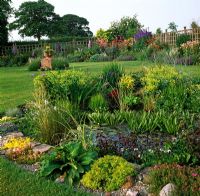 Wide range of interesting herbaceous plants and lily pond at Argoed Cottage Flintshire NGS
