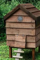 Rustic wooden hen house made from recycled timber