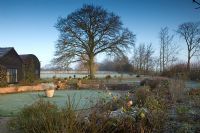 Informal country garden in winter - Rolls Farm, Helions, Bumpstead