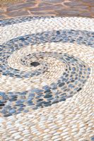Cobbled spiral pattern on patio area