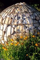 Stone filled circular steel gabion at RHS Hampton Court Flower Show