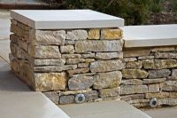 Detail of limestone steps with recessed lighting