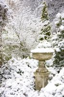 Garden urn in snow at Honeybrook House Cottage, Worcestershire
