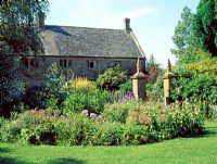 Mixed bed surrounding garden pond - Lower Severalls