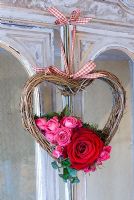 Small Valentine's wreath with pink and red roses with ivy