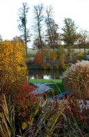Autumn colour in the walled garden - view past beech hedge to the pool and The Birkett Long Millenium Walk - Marks Hall, Essex
