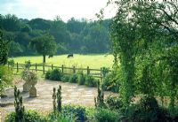 View from garden over boundary fence to open fields - Saltford Farm, Bath, UK