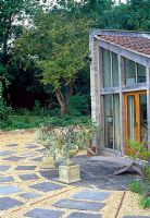 Edge of conservatory with gravel and paving - Saltford Farm, Bath, UK