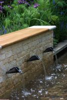 Water feature with seating The QVC Garden, sponsored by QVC - Silver Flora medal winner at RHS Chelsea Flower Show 2009