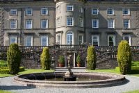 Terraced gardens, with fountain and statue, Rydal Hall, Cumbria, in Spring
