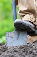 Digging a vegetable garden with a spade
