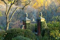 The gates with ornamental details bordering the Rose Garden, Dumbarton Oaks, Washington DC
