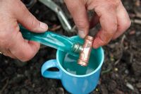 Garden watering system - Step 4 - Soften the hose in hot water and fit onto 15mm yorkshire copper tee piece