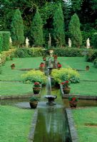 The Water Garden with Alcemilla mollis by bridge - Llanllyr Garden, Talsan, Ceredigion, Wales