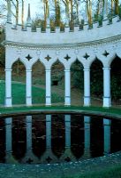The Exedra reflected in the Pond - Painswick Rococo Garden, Painswick, Gloucestershire in February
