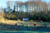View to the Exedra across the Kitchen Garden taken from The Bowling Green - Painswick Rococco Garden, Painswick, Gloucestershire in February