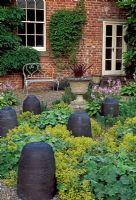 Terrace by house with Alchemilla mollis and pots by France Carlile - Glansevern Hall Gardens, Welshpool, Wales in July