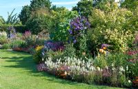 Main border at Merriments Gardens, Hurst Green, East Sussex in August