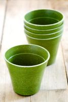 Small plant pots made from 100 biodegradable material, bamboo fibres