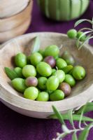 Olives in wooden bowl 