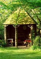 Wooden Summerhouse in country garden