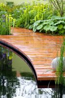 Pond with decking - The Foreign and Colonial Investments Garden, Sponsored by Foreign and Colonial Investment Trust, Contractor The Outdoor Room - Silver Flora medal winner at RHS Chelsea Flower Show 2009 