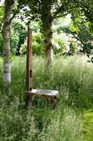 Eastgrove Cottage garden - Rustic chair made from a Nepalese cartwheel