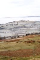 Frosted farmland in low lying cloud, looking towards the Brecon Beacons