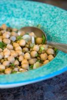 Chickpea salad in a blue bowl