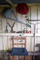Old tools and chair in potting shed