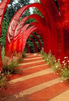 Artificial paradise, showing red shadow from on path - France