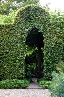 Clipped hedge forming an archway