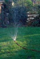 A pulse-jet sprinkler has a single jet that rotates in a series of pulses.
