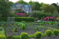 View from the kitchen garden, now used as allotments for local people, to the house, built in the Victorian Gothic style in 1862 as a hunting lodge - Lukesland, Harford, Ivybridge, Devon