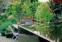 Raised pond in contemporary garden - Garstons, Isle Of White