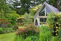 View of house from flowerbed - Breedenbroek, New Zealand