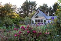 Herbaceous border and view of house - Breedenbroek, New Zealand
