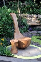 Hand crafted Oak seat in the shape of spoon - Welcome to Yorkshire's Rhubarb Crumble and Custard Garden, Silver medal winner at RHS Chelsea Flower Show 2010 
