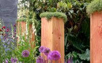 Raised wooden honeycomb planters - Global Stone Bee Friendly Plants Garden, Silver medal winner at RHS Chelsea Flower Show 2010
