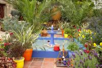Pond in colourful Moroccan garden, Hillier Nurseries, RHS Chelsea Flower Show 2010 