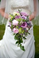 Bride's bouquet in July with purple Roses, Peony, Rosemary, Lavender and Astrantia major