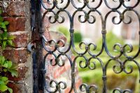 Ornate iron gate at Bignor Park, Sussex