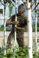 Woven willow figure. 'Forces of Nature' - Silver Gilt Award Winner - RHS Hampton Court Flower Show 2010 
 