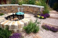 Brick built rustic fire pit - 'The Fire Pit Garden' - Silver Medal Winner at the RHS Hampton Court Flower Show 2010 
