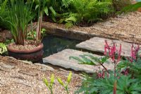 Small pool with stepping stones. 'The Yoga Garden' - Bronze Medal Winner - RHS Hampton Court Flower Show 2010
 