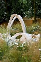 Recycled artificial stone sculpture. 'Together Again - D-Shape Garden' - Gold Medal winner - RHS Hampton Court Flower Show 2010 
 